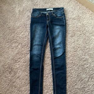 Blue RSQ skinny jeans.